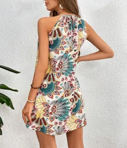 Back view of chic bohemian feather print halter sleeveless mini dress for women