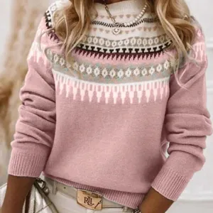 Dettaglio ravvicinato del maglione in maglia rosa Fair Isle con motivi geometrici