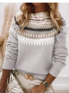 Close-up of women's vintage jacquard knit sweater with soft gray fair isle pattern