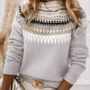 Detailed view of women's Nordic jacquard knit sweater in grey and white