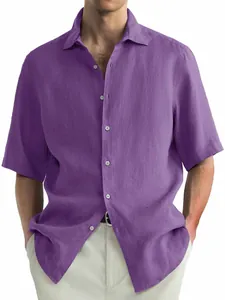 Detail view of the washed cotton texture on a casual purple short-sleeved men's shirt.