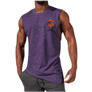 Detail view of men's muscle tank top with sunset palm tree print on chest.