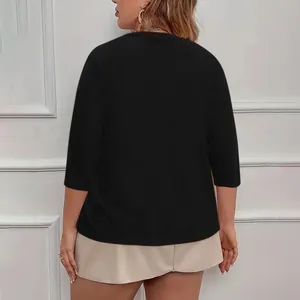 Back view of elegant plus size black knit top for women with mid-length sleeves