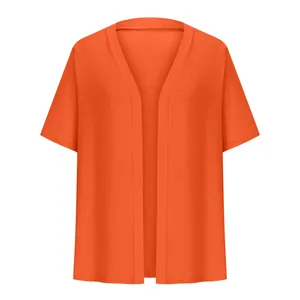 Flat lay view of an elegant bright orange short-sleeved open front cardigan shrug for women