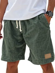 Short décontracté vert pour hommes avec cordon de serrage, aspect lin et écusson en cuir