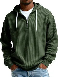 Close-up of olive green ribbed hoodie with quarter-zip and drawstring details