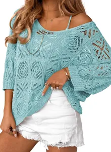 Close-up detail of light blue crochet hollow-out knit sweater with off-shoulder design