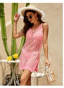 Elegant pink knit hollow-out summer beach cover-up dress featuring sleeveless design and side slit