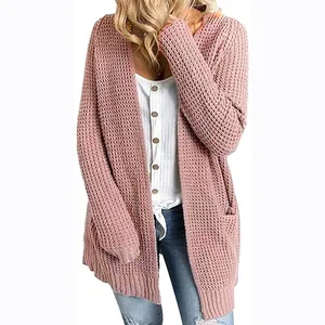 Pink textured knit cardigan with front pockets showing detailed fabric weave for women