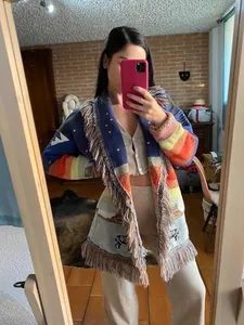 Vintage jacquard knit cardigan with colorful fringe and unique bold ethnic patterns
