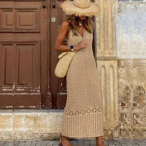 Stylish bohemian beige crochet knit sleeveless maxi beach cover-up dress for summer vacation