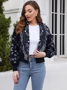 Cárdigan de punto azul marino con estampado jacquard de cachemira y flecos