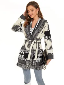 Women's thick ethnic geometric knit cardigan featuring fringe trim and matching belt