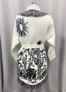 Detail of back view on cactus jacquard cardigan with fringe trim and waist belt