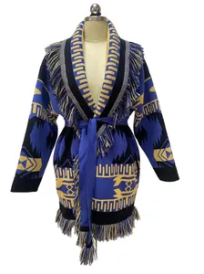 Close-up detail of bohemian jacquard wool cardigan with fringe lapel and waist belt