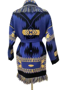 Back view of bohemian jacquard knit cardigan with fringed hem and geometric patterns