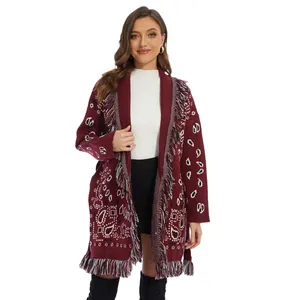 Burgundy knit cardigan with vintage paisley jacquard pattern and boho tassel trim details