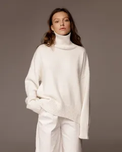 Elegant white oversized thick-knit turtleneck sweater for women's autumn winter fashion