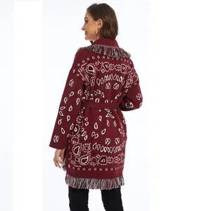 Detailed back view of burgundy boho knit cardigan with fringe and jacquard patterns