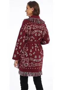 Elegant wine red mid-length knit cardigan with ethnic jacquard patterns and tassel trim