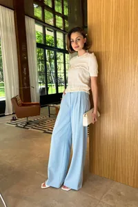 Elegant white crew neck short sleeve knit sweater with textured pattern for summer.