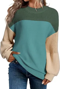 Detail view of color-blocked lantern sleeve knit sweater with round neck for women