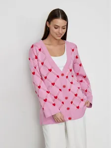 Pink knit cardigan for women with red heart jacquard pattern and button down closure