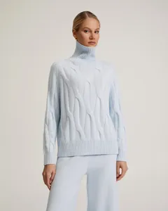 Elegant light blue women's two-piece cable knit turtleneck sweater and pants lounge set