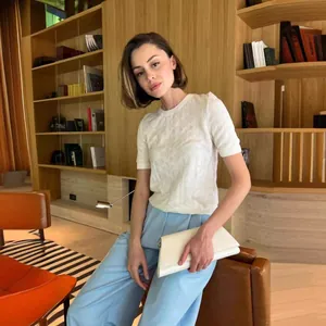 Elegant white crew neck short sleeve knit sweater with sophisticated textured pattern for women