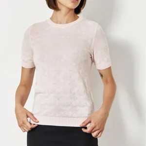 Elegant women's round neck short sleeve knit sweater in soft pink with diamond pattern