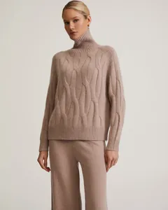 Elegant beige cable knit turtleneck sweater and matching wide-leg pants loungewear set