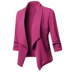 Detailed view of women's fuchsia blazer with ruched sleeves and draped open front