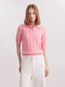 Elegant pink short sleeve knit polo sweater for women against a clean studio backdrop