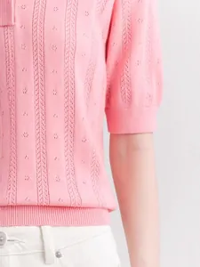 Pink polo collar short sleeve knit sweater with delicate eyelet patterns and ribbed hem
