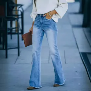 Premium women's high-waisted light wash flared denim jeans with a trendy raw hem finish