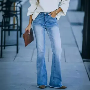 Chic high-waisted stretchy blue flare jeans for women with raw hem and street style vibe