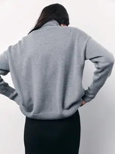 Detailed back view of a grey loose turtleneck knitted sweater for women's autumn fashion