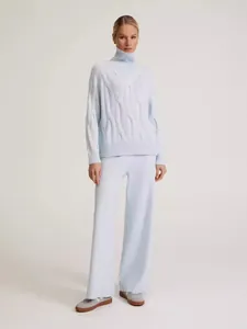 Women's light blue turtleneck cable knit sweater and wide-leg pants two-piece set