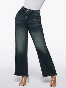 Lower body view of women's vintage washed wide-leg jeans with a stylish raw hem finish