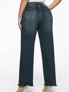 Back view of women's vintage washed straight leg cropped denim jeans with raw hem