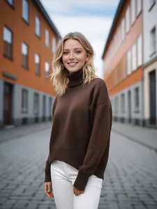 Close-up of a cozy brown turtleneck knit sweater for women in an outdoor street setting