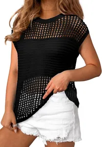 Detailed view of women's black hollow-out knit sweater with crew neck and short sleeves.