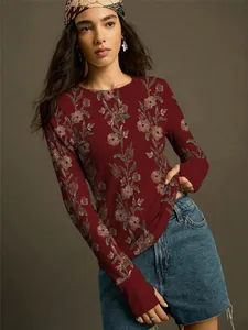 Close-up detail of vintage floral print knit long sleeve slim fit T-shirt for women