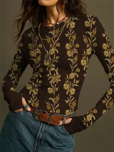 Detail view of vintage floral print on slim fit brown knit long sleeve T-shirt for women.