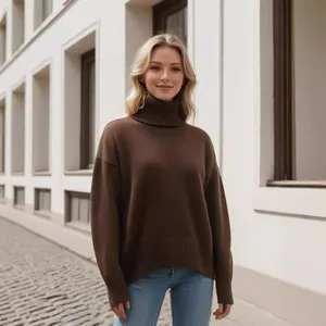 Stylish women's brown thick turtleneck knit sweater in loose fit for autumn and winter