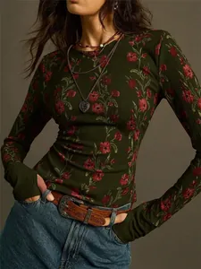 Detail of retro floral print on dark green long-sleeved knitted slim-fit T-shirt