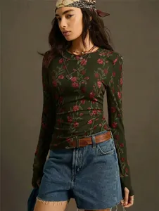 Detail showing the vintage floral print and knit texture of a slim-fit long sleeve tee.