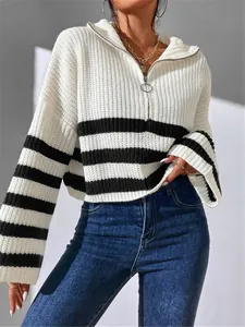 Women's white and black striped knitted sweater with stand collar and zipper detail