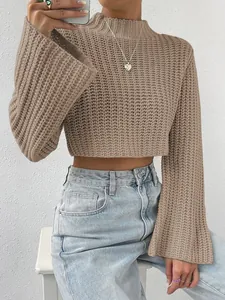 Detail view of khaki mock-neck knit sweater featuring trendy oversized bell sleeves