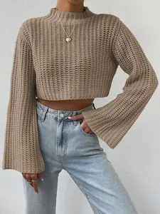 Detailed view of a stylish khaki mock neck cropped sweater featuring elegant bell sleeves